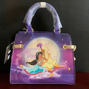 Brand new, never used Disney Loungefly Aladdin pocketbook.